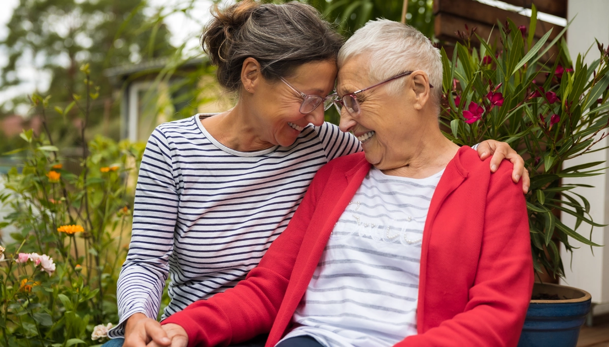 two-older-women-smiling-at-each-other-1200x683.webp