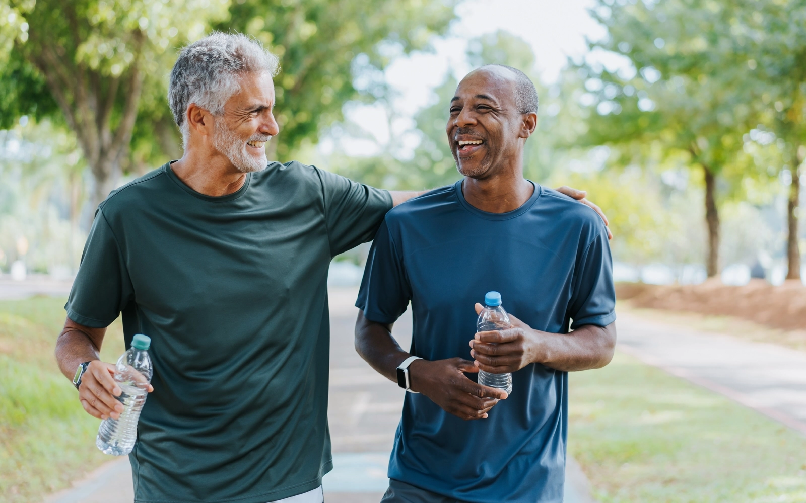 men-smiling-on-a-walk-1600x1000.webp